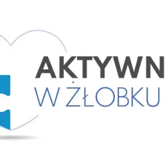 Niebieski element puzzla w kształcie serca z napisem "AKTYWNIE W ŻŁOBKU".