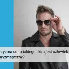 Charyzmatyczny mężczyzna w okularach przeciwsłonecznych i skórzanej kurtce.
