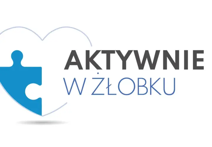Niebieski element puzzla w kształcie serca z napisem "AKTYWNIE W ŻŁOBKU".