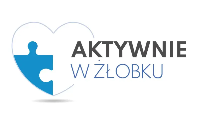 Niebieski element puzzla w kształcie serca z napisem "AKTYWNIE W ŻŁOBKU".