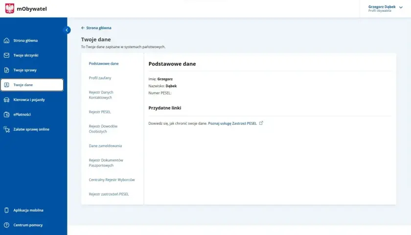 Ekran aplikacji mObywatel z sekcją "Twoje dane", gdzie widoczne są podstawowe dane osobowe i link do zastrzeżenia PESEL.