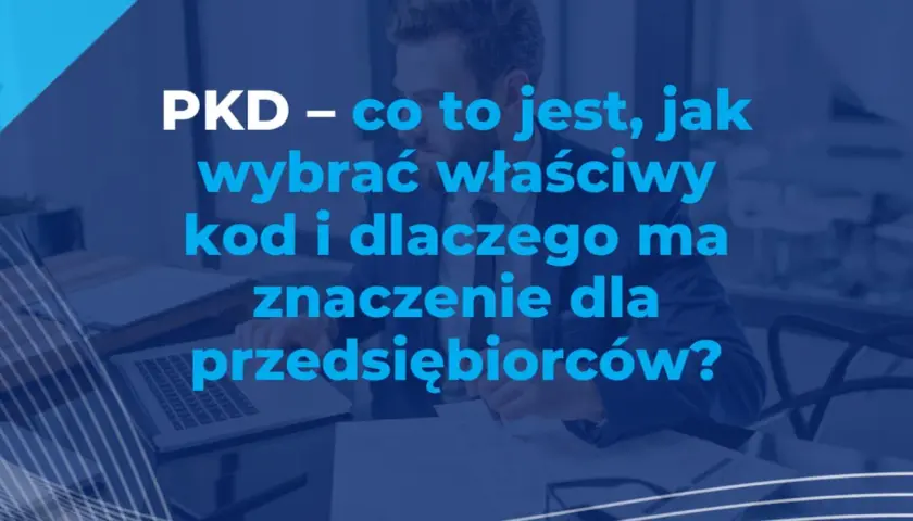 PKD – co to jest, jak wybrać właściwy kod i dlaczego ma znaczenie dla przedsiębiorców? Mężczyzna w garniturze analizuje dokumenty przy biurku.